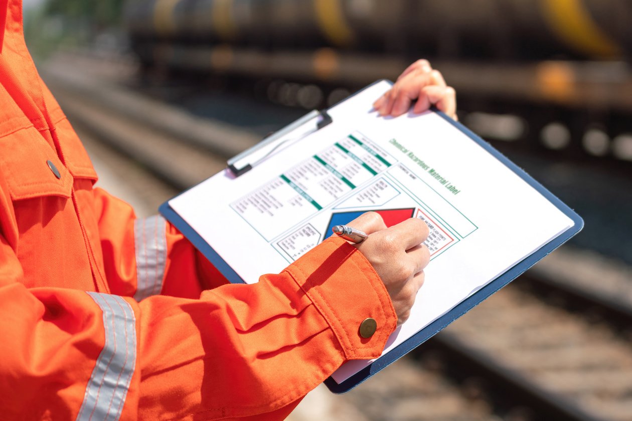 Engineer is checking on the chemical hazard material form