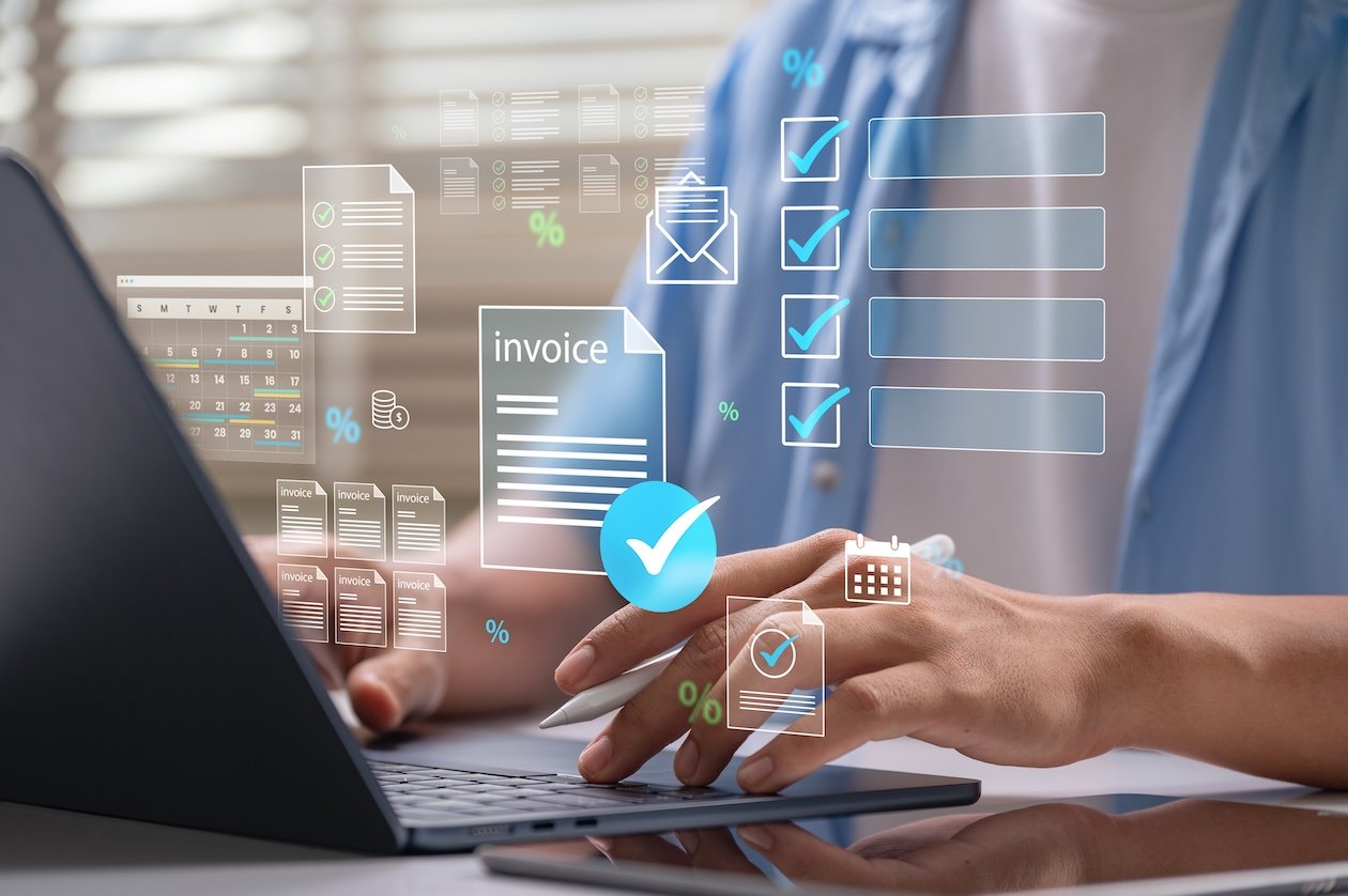 Man using a laptop to manage digital invoice processing and billing workflow, reviewing an on-screen payment checklist and financial management dashboard.